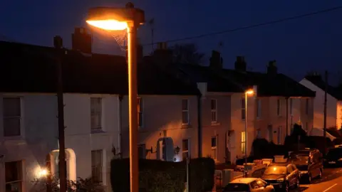 Getty Images A street light and terraced housing