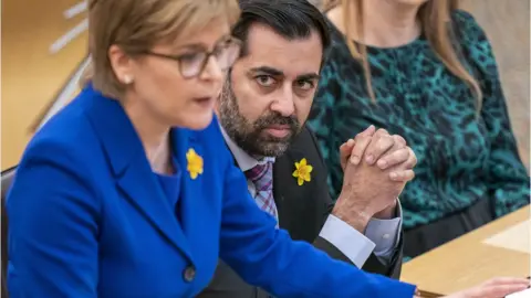 PA Media Yousaf and Sturgeon at FMQs