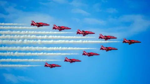PA Media Red Arrows air display