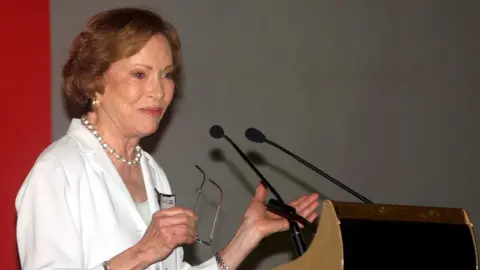 EPA Former US first lady Rosalynn Carter at a podium in New Delhi