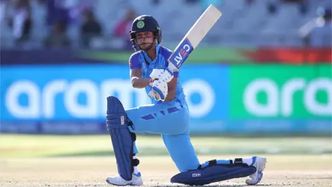 Getty Images Harmanpreet Kaur of India plays a shot during the ICC Women's T20 World Cup Semi Final match