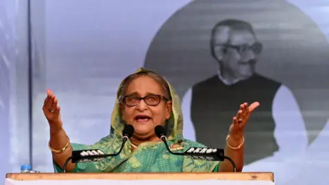 Getty Images Bangladesh prime minister Sheikh Hasina speaks at a rally
