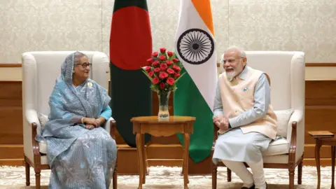 Getty Images Sheikh Hasina (left) with Narendra Modi on the sidelines of the G20 summit in Delhi