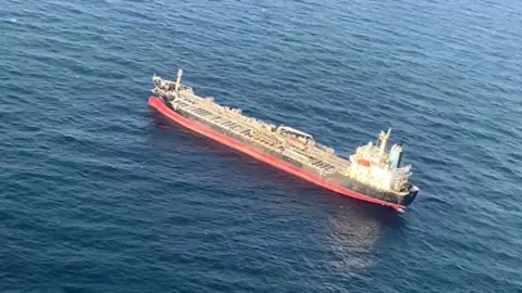 Indian Coast Guard Aerial shot of the Chem Pluto, which was hit in a drone strike