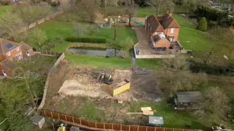 Andy Meeson/BBC The area which housed the unauthorised spa building is now clear
