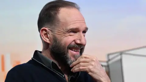 Jeff Overs/BBC Ralph Fiennes