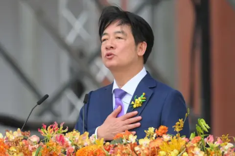 Getty Images Taiwan's President Lai Ching-te delivers his inaugural speech after being sworn into office during the inauguration ceremony at the Presidential Office Building in Taipei on May 20, 2024.