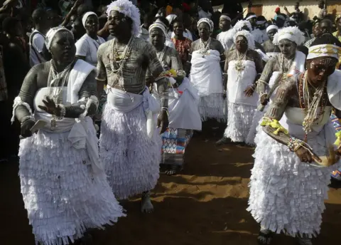 EPA Ivorians take part in the festival of Abissa in Grand-Bassam, Ivory Coast, 04 November 2017. The feast of the Abissa, a feast of rejoicing organized by the N"Zima community to symbolize the concepts of democracy and social justice. The N"Zima, a people of Ghanaian origin, finds herself around her leader and to the sounds of the tams-tams to take stock of the past year, and eventually denounce the injustices committed, or confess them publicly within the framework As part of a request for forgiveness to the people and an repentance. The festival of Abissa is celebrated each year between the end of October and the beginning of November