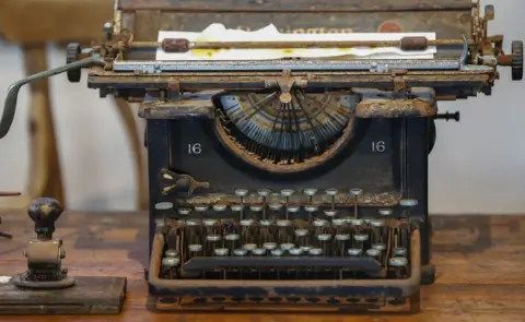 EPA An old typewriter on display at the South African Police Service"s (SAPS) Heritage Services Museum in Muizenberg, Cape Town, South Africa, 09 November 2017. South Africa has one of the highest violent crime rates in the world with a very high rate of murders, assaults, rapes and other crimes. The South African Police Service"s has released the crime statistics for 2017 showing as many as 2,129,001 serious crimes were recorded in 2017 an increase from 2015/16. The SAPS Heritage Services Museum dating back to before 1874 portrais various era"s of South African policing and documents famous crimes whilst also giving the visitor a view into a prison cell, courtroom and charge office.