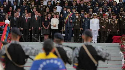 Reuters Venezuela's President Nicolas Maduro (C) speaks during a military parade in Maracay, Venezuela, November 27, 2017.
