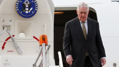 Reuters U.S. Secretary of State Rex Tillerson steps off his plane as he arrives to the presidential hangar in Mexico City, Mexico February 1, 2018