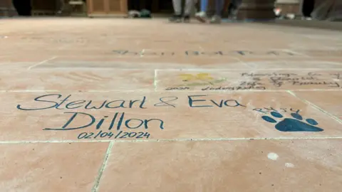 Messages left on the cathedral floor tiles