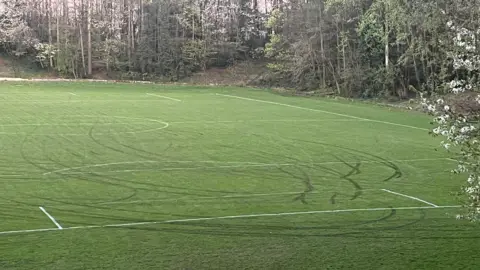 Jimmy Johnstone Academy Quadbike marks over pitch