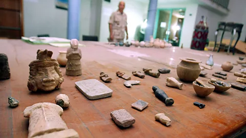 Getty Smaller, more easily transported pieces can fetch much more on the black market than large artefacts (Credit: Getty)