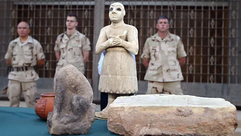 AFP/Getty Images This ancient Sumerian statue is among thousands of ancient looted treasures stolen from the National Museum in Baghdad in 2003 (Credit: AFP/Getty Images)