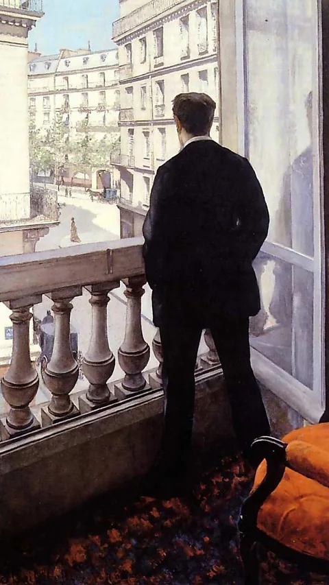 Gustave Caillebotte In Young Man at the Window (1876), the artist’s brother René looks out at Haussmann’s new city below (Credit: Gustave Caillebotte)