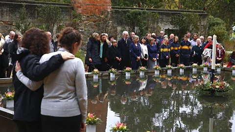 Getty Images After 35 people were killed at Port Arthur Historic Site, shown here on the 20th anniversary of the event, Australia passed laws to reduce gun ownership (Credit: Getty Images)