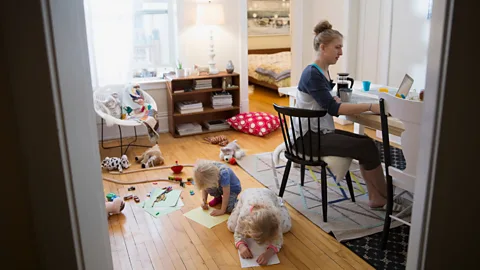 Alamy Women take on a vastly disproportionate amount of housework and childcare – demands that can take a part-time job to manage, experts say (Credit: Alamy)