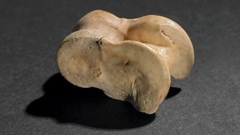 The Trustees of the British Museum/ CC BY-NC-SA 4.0 The knucklebone of a sheep was played with and rolled like a die (Credit: The Trustees of the British Museum/ CC BY-NC-SA 4.0)