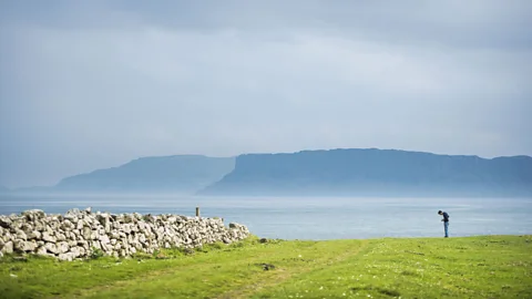 Getty Images The island of Rathlin first got mains electricity when wind turbines were introduced on the island (Credit: Getty Images)