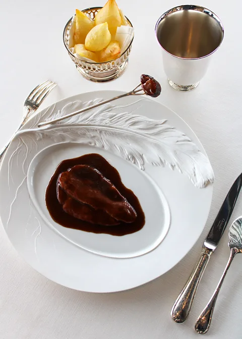 Matthieu Salvaing The signature dish at La Tour d'Argent is canard au sang (bloody duck) (Credit: Matthieu Salvaing)